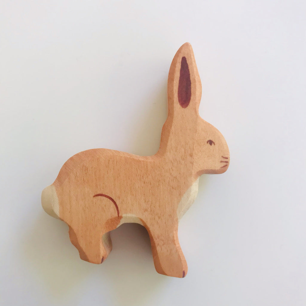 hand made wood rabbit, detailed face and markings