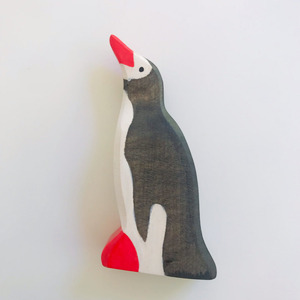 hand crafted wood penguin, detailed painting